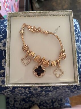 Adrienne Vittadini Gold Tone Charm Bracelet with Black Center Charm
